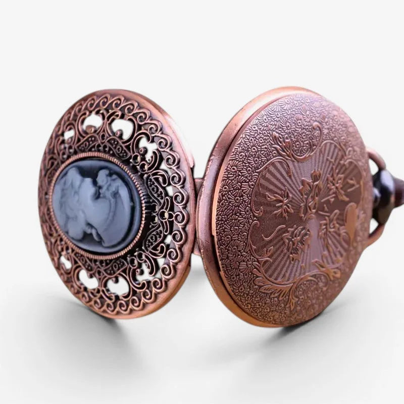 Trendy womens necklace watch with antique bronze color, intricate filigree, and dark blue cameo detailing