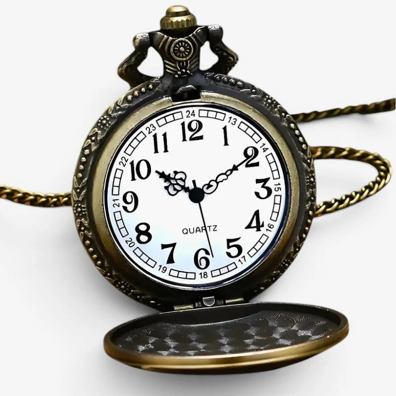 Antique-style brass truck pocket watch with white face black numerals hands and vintage ornate design