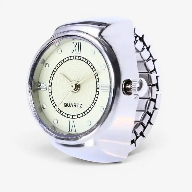 Vintage ring watch silver-toned quartz with white dial roman numerals and textured metallic band