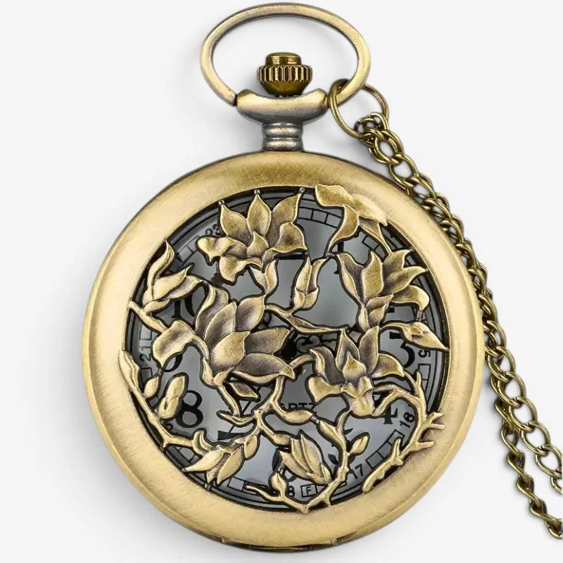 Womens antique brass pocket watch with intricate floral filigree design and matching chain for elegant style