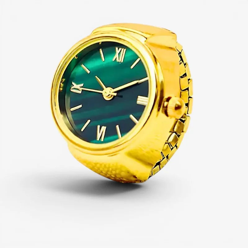 Womens antique ring watch with gold-tone band and teal-green striped dial featuring roman numeral markers