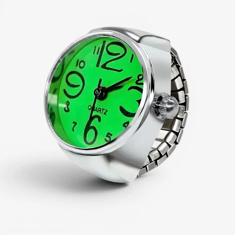Womens green ring watch featuring a sleek silver-toned band and a vibrant green face with bold black numerals