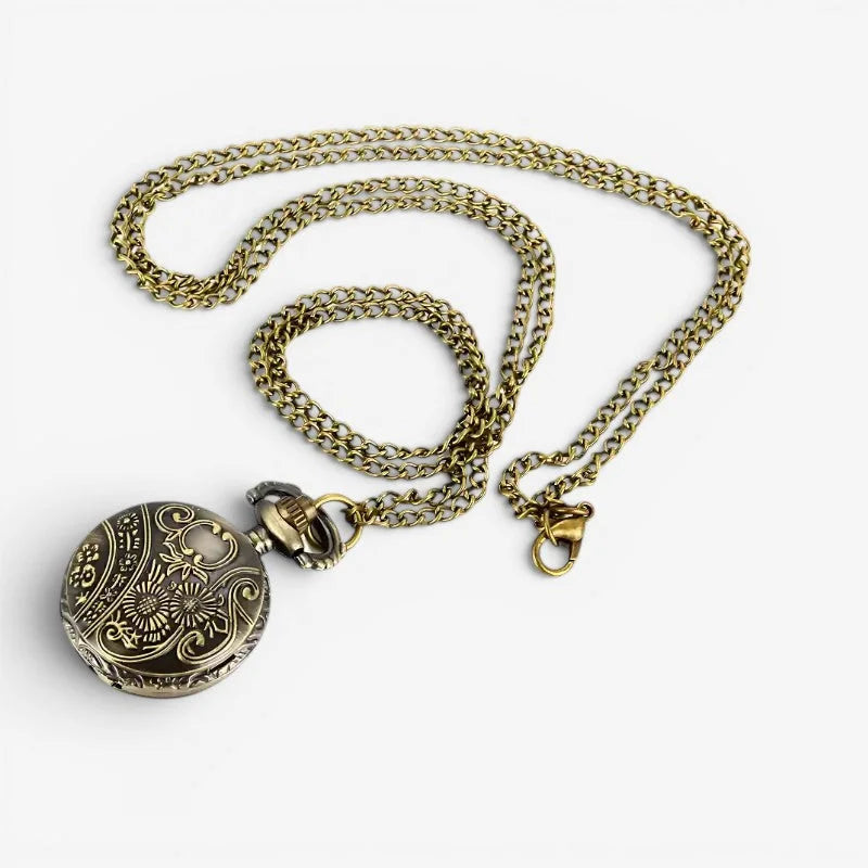 Antique brass womens necklace pocket watch with intricate floral engraving and matching chain for elegant style