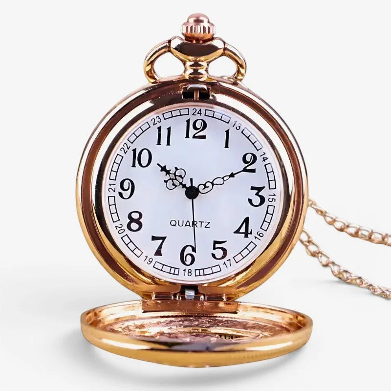 Womens owl pendant watch with a gold-toned pocket watch, white face, black numerals and hands, and matching chain