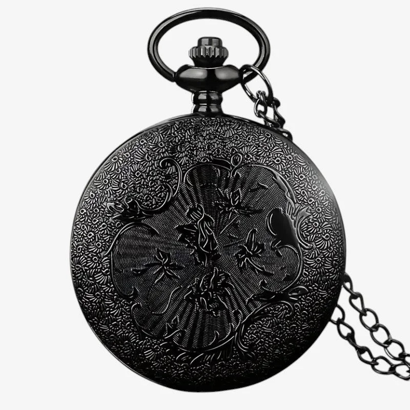 Black antique-style womens pendant watch with engraved floral and dragonfly designs on circular face with chain