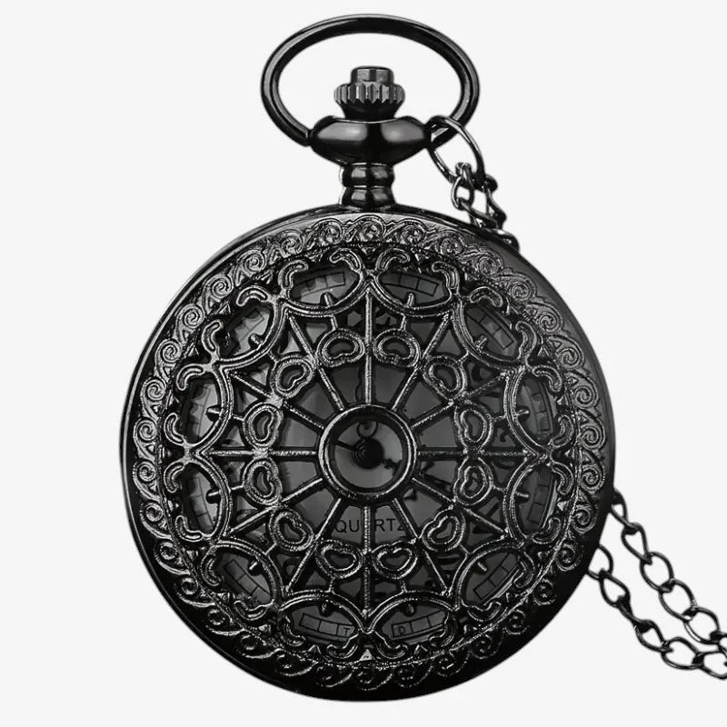 Black ornate womens pendant watch with intricate filigree design and attached chain in metal finish