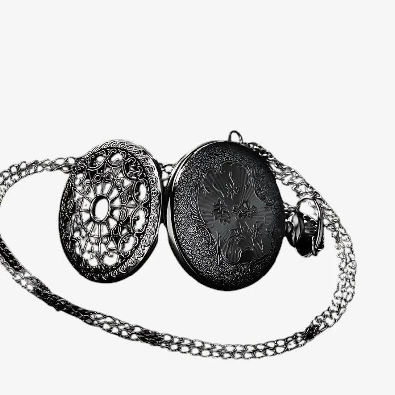 Black ornate womens pendant watch with intricate filigree and engraved floral patterns on a delicate chain