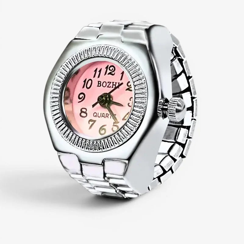 A sleek silver-toned bozhy quartz womens pink ring watch with a pink dial and textured bezel