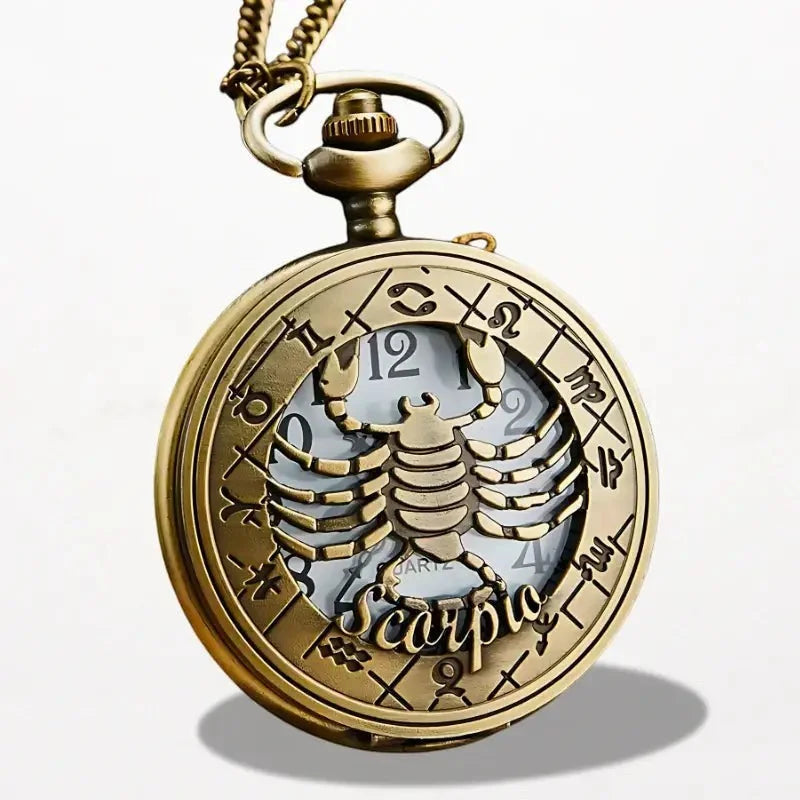 Antique brass-colored zodiac pocket watch with detailed scorpion design and scorpio engraving on the front side