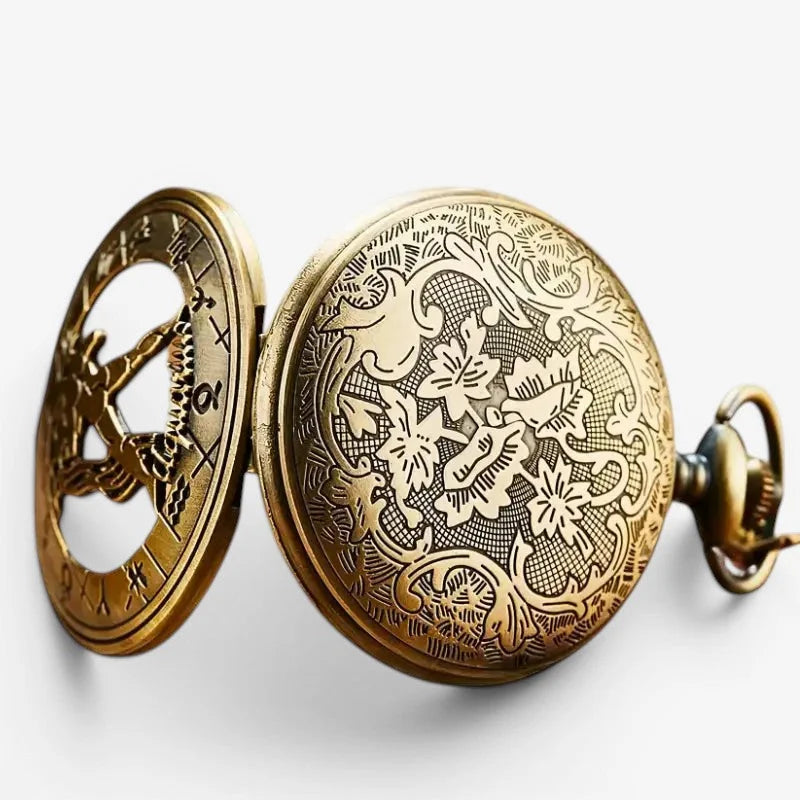 Antique brass zodiac pocket watch with intricate floral scrollwork engraving roman numerals and decorative keyhole on face