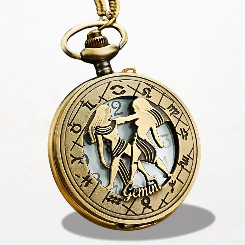 Golden brass zodiac pocket watch with twin-themed design, intricate zodiac symbols, and gemini engraving below